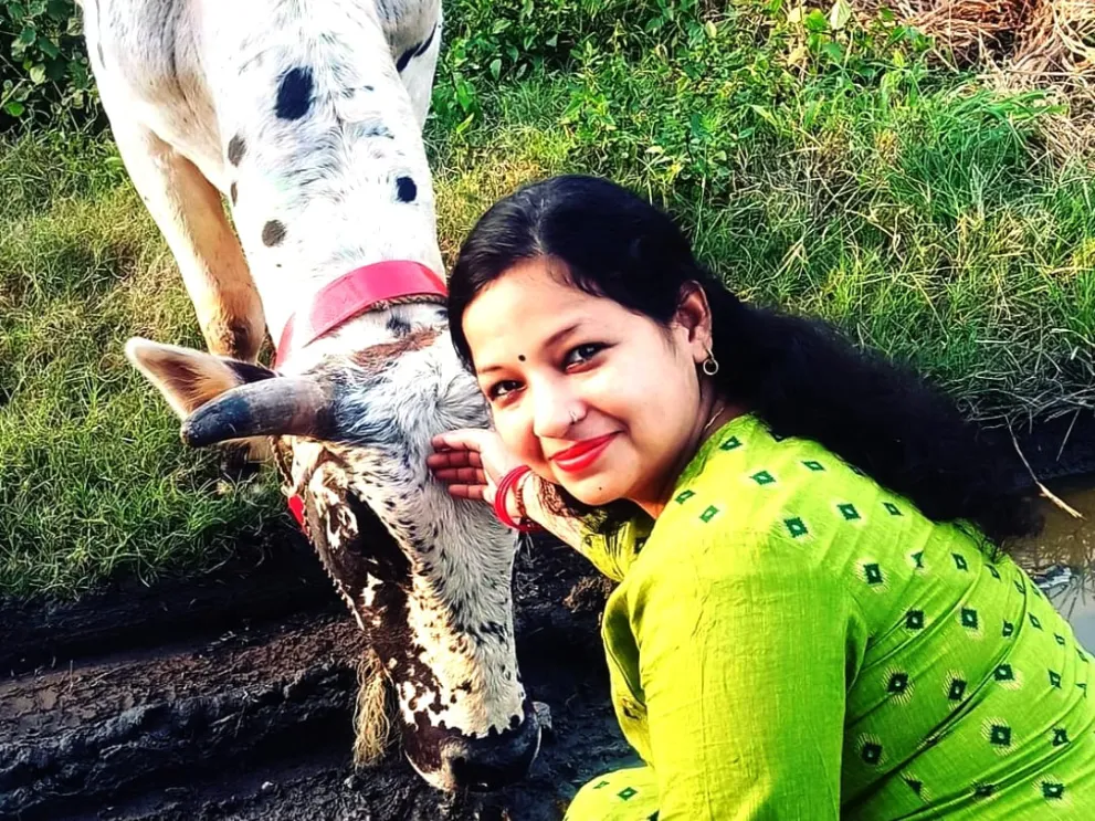 Nikita Suyal, founder of A.S.H.R.A.Y, caring for a rescued animal